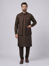 Wash and Wear Qameez Shalwar with matching waist coat.