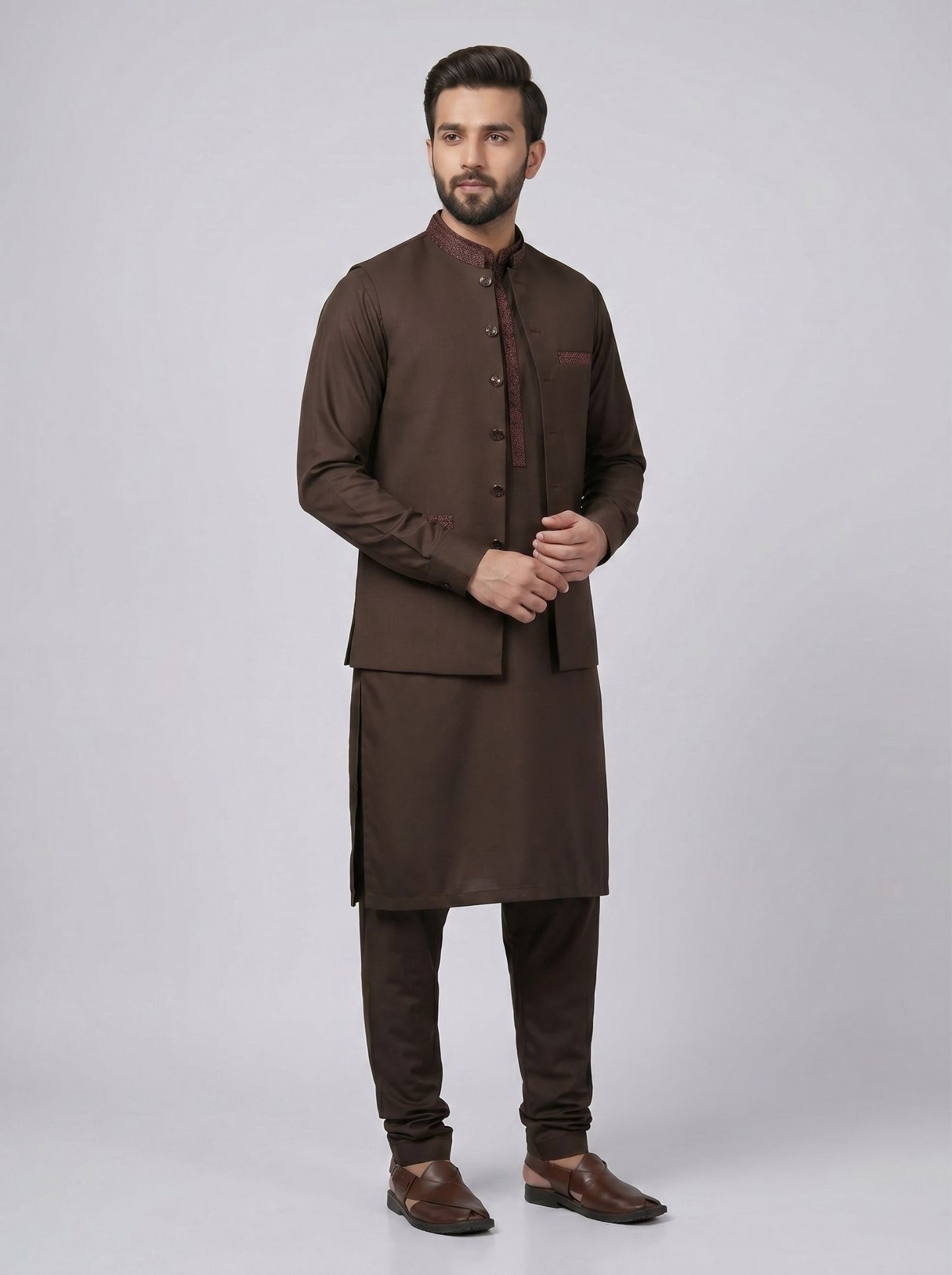 Wash and Wear Qameez Shalwar with matching waist coat.