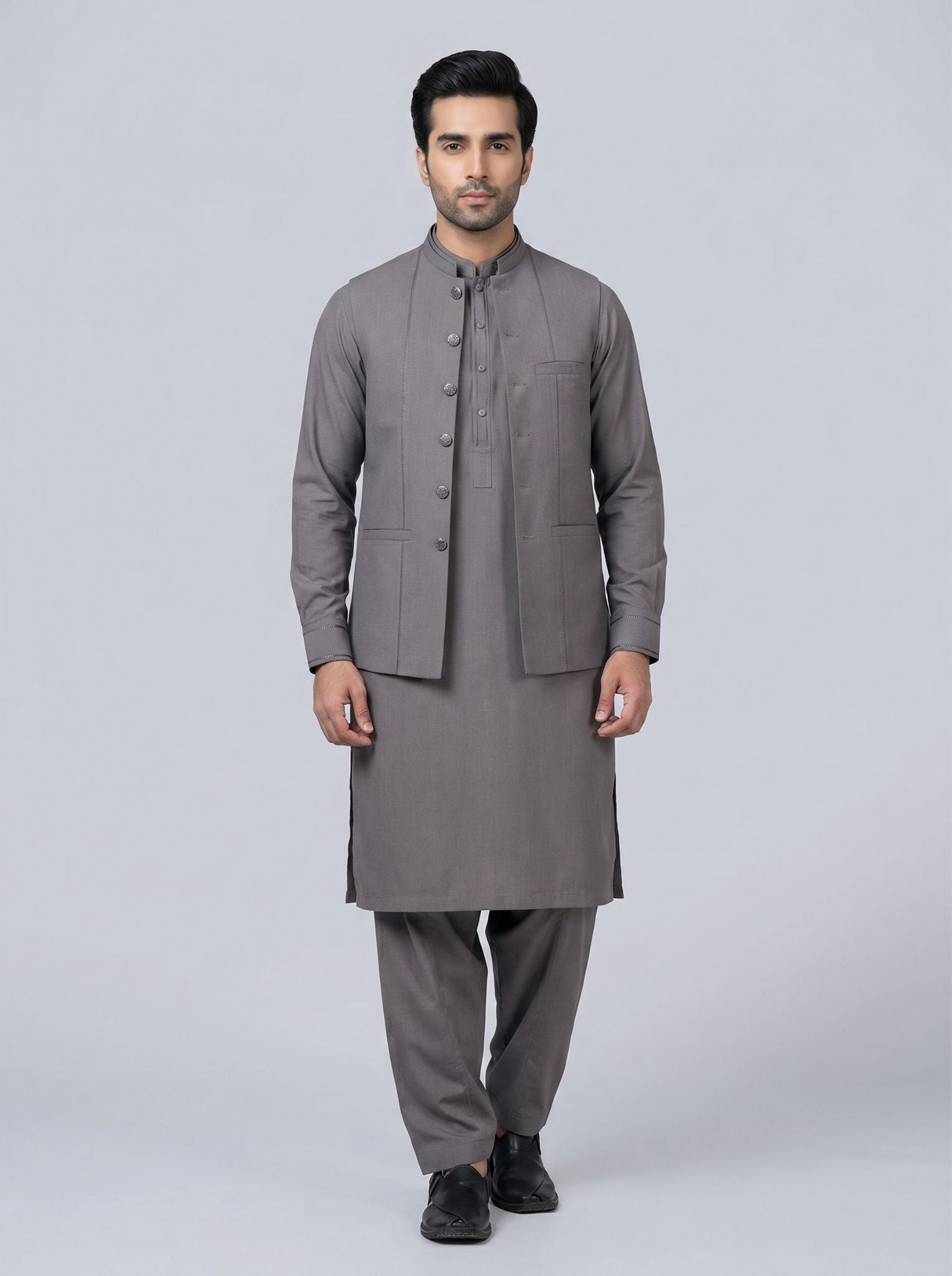 Wash and Wear Qameez Shalwar with matching waist coat.