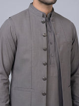 Wash and Wear Qameez Shalwar with matching waist coat.