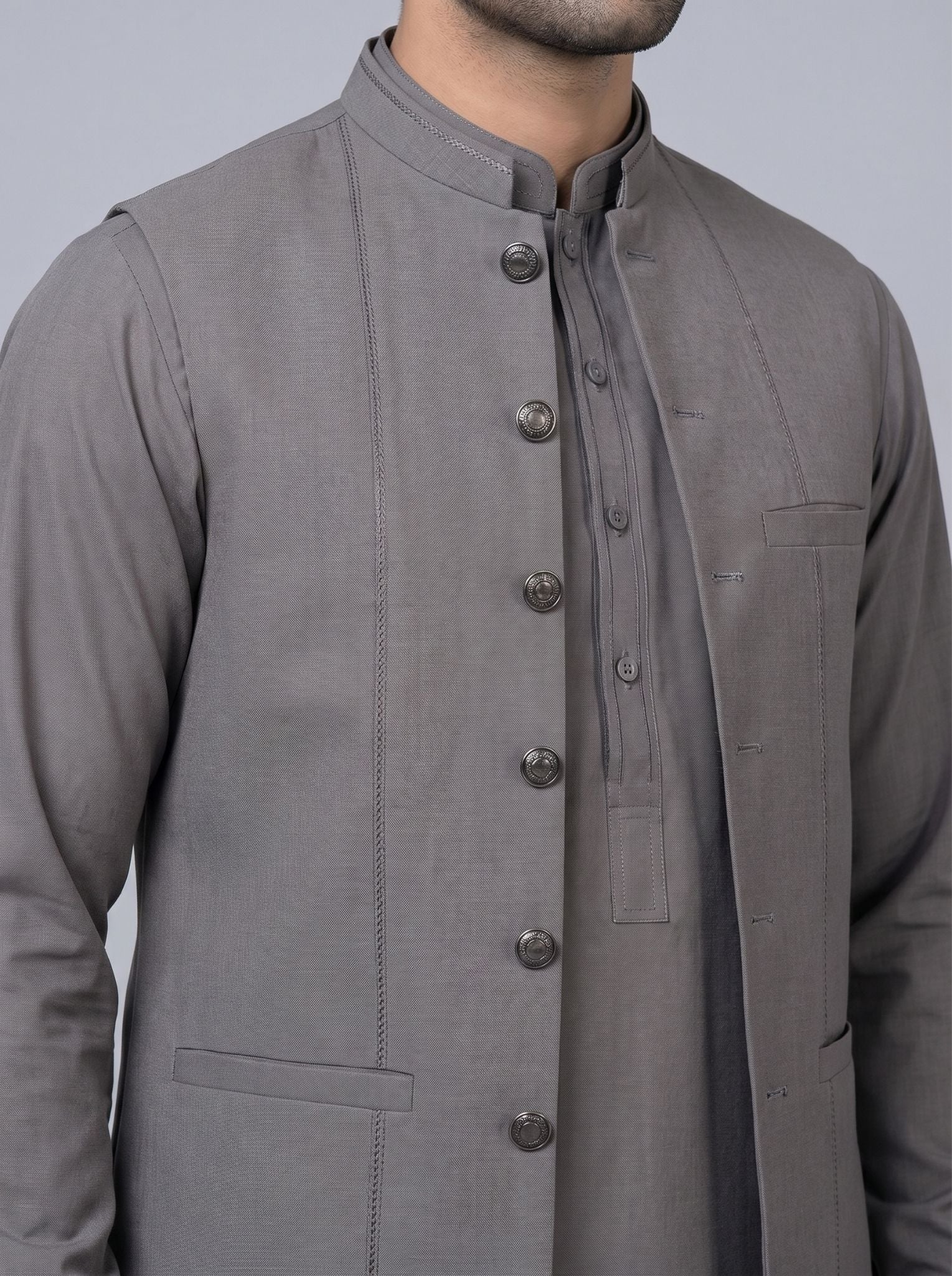 Wash and Wear Qameez Shalwar with matching waist coat.