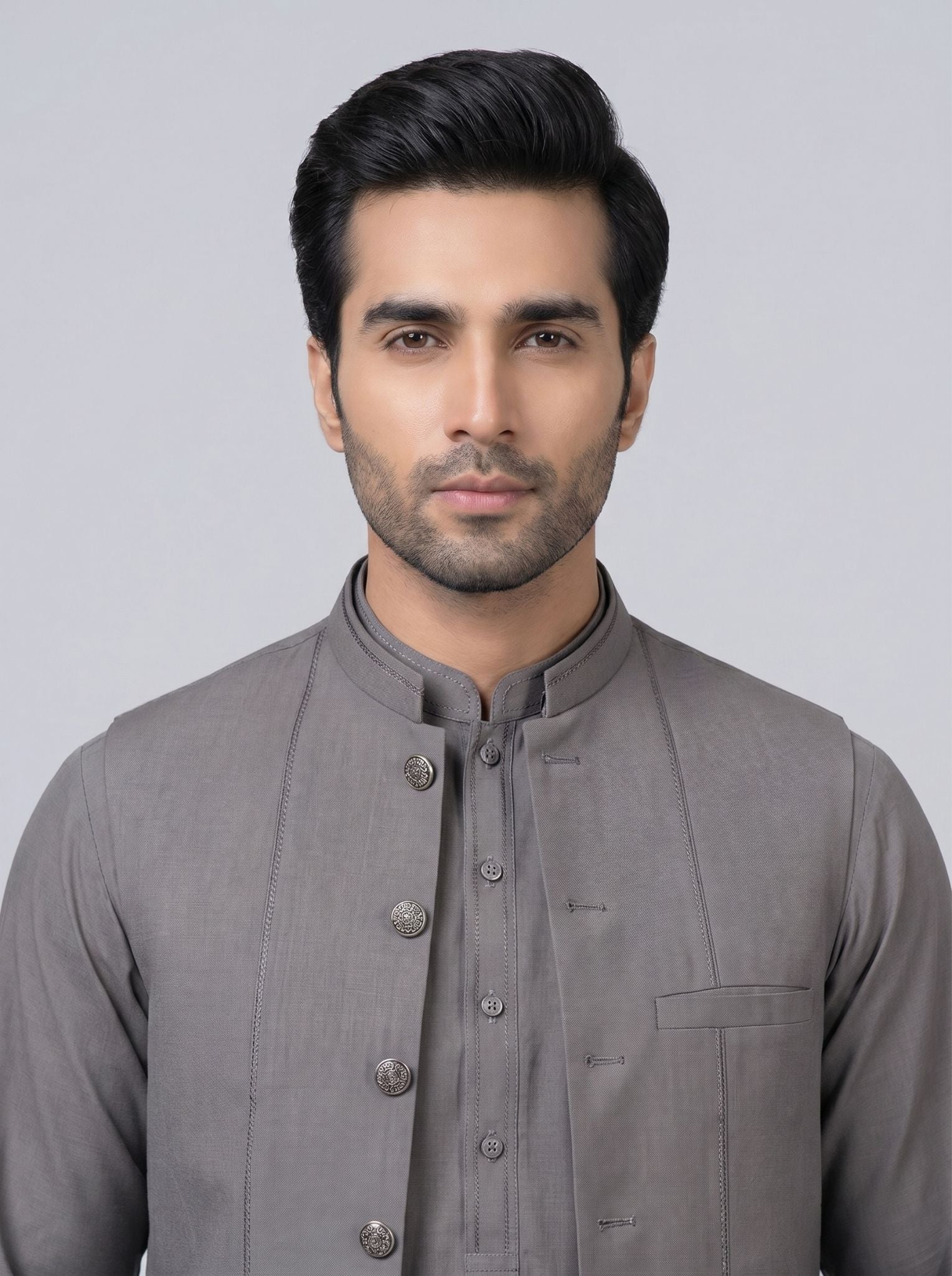 Wash and Wear Qameez Shalwar with matching waist coat.
