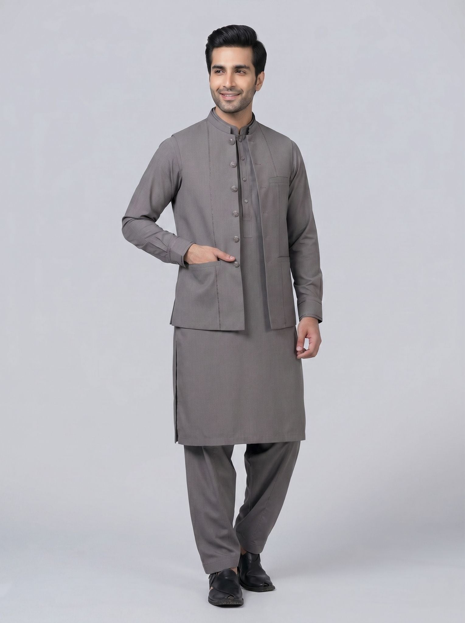 Wash and Wear Qameez Shalwar with matching waist coat.